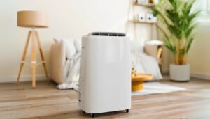 A portable ac heat pump fixes on wheels in a cozy living room, featuring a lamp, stylish couch, and greenery in the background.